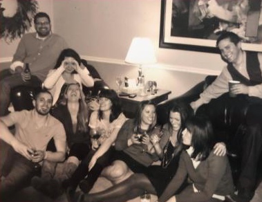 The family together in a living room, from the cookbook cover